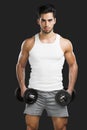 Athletic man lifting weights Royalty Free Stock Photo