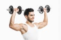 Athletic man lifting weights Royalty Free Stock Photo