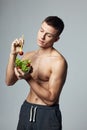 athletic man with a pumped body plate salad vegetables healthy food lifestyle