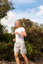 Athletic man runner jogging in nature outdoor Royalty Free Stock Photo