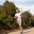 Athletic man runner jogging in nature outdoor Royalty Free Stock Photo