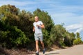 Athletic man runner jogging in nature outdoor Royalty Free Stock Photo