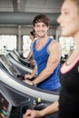 Athletic man running on treadmill Royalty Free Stock Photo