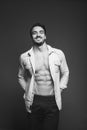 Athletic man with unbuttoned shirt, black and white Royalty Free Stock Photo