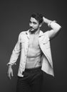 Athletic man with unbuttoned shirt, black and white Royalty Free Stock Photo