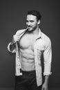 Athletic man with unbuttoned shirt, black and white Royalty Free Stock Photo