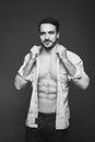 Athletic man with unbuttoned shirt, black and white Royalty Free Stock Photo