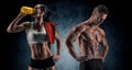 Athletic man and woman after fitness exercise Royalty Free Stock Photo