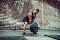 Athletic man working out with a barbell. Strength and motivation. Exercise for the muscles of the back