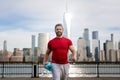 Athletic Mature Fit Strong Muscular Man with yoga mat in New York City. Athletic man workout in NYC. Athletic Senior