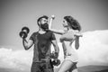 Athletic people. Young sporty sexy couple showing muscle and workout outside. Royalty Free Stock Photo