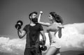 Athletic people. Young sporty sexy couple showing muscle and workout outside. Royalty Free Stock Photo