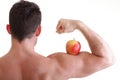 Athletic male body builder holding red apple Royalty Free Stock Photo