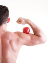 Athletic male body builder holding red apple Royalty Free Stock Photo