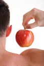 Athletic male body builder holding red apple Royalty Free Stock Photo