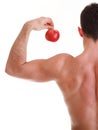 Athletic male body builder holding red apple Royalty Free Stock Photo