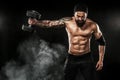 Muscular young fitness sports man workout with barbell in fitness gym Royalty Free Stock Photo