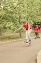 Athletic skilled young girl roller skating Royalty Free Stock Photo