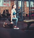 Athletic Smilling Woman Doing Lunges with Dumbbells