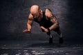 Sporty shaved head sporty male doing push ups with jumps.