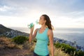 Athletic woman drinking water after workout Royalty Free Stock Photo