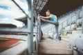 Athletic woman going for a jog or run at running track. Healthy fitness concept of modern lifestyle Royalty Free Stock Photo