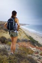 Athletic Woman Hiking Ocean Scenery