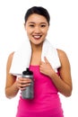 Athletic woman holding sipper bottle Royalty Free Stock Photo