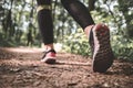 Athletic woman legs in sneakers outdoors. Royalty Free Stock Photo