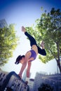 Athletic woman performing handstand on bar Royalty Free Stock Photo