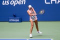 Athletic woman playing tennis on a court in the US Open 2023 tournament