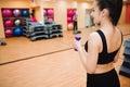 Athletic woman trainer doing aerobic class with steppers. Sport Royalty Free Stock Photo