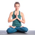 Athletic young blonde woman doing yoga practice isolated on white background. Royalty Free Stock Photo