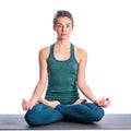 Athletic young blonde woman doing yoga practice isolated on white background. Royalty Free Stock Photo