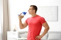 Athletic young man drinking protein shake Royalty Free Stock Photo