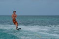 Athletic Young Wakeboarder Riding a Wakeboard in Aruba Royalty Free Stock Photo