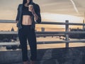 Athletic young woman with cup in London at sunrise Royalty Free Stock Photo