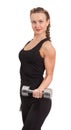 Athletic young woman with dumbbell