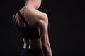 Athletic young woman showing muscles of the back Royalty Free Stock Photo