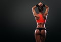 Athletic young woman showing muscles of the back Royalty Free Stock Photo