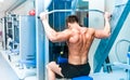 Athletically built sportsman in the gym Royalty Free Stock Photo