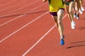 Athletics people running on the track field. Sunny day Royalty Free Stock Photo