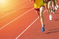 Athletics people running on the track field. Sunny day Royalty Free Stock Photo