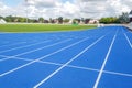 Athletics running track blue treadmill in sport stadium field