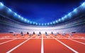 Athletics stadium with race track with starting blocks front view Royalty Free Stock Photo