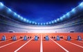 Athletics stadium with race track with starting blocks Royalty Free Stock Photo