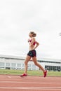 Athletics woman Track Athlete Running On Track