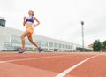 Athletics woman Track Athlete Running On Track