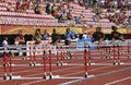 Athlets running 100 metres hurdles semi-final in the IAAF World U20 Championship in Tampere, Finland 14 July, 2018. Royalty Free Stock Photo