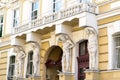 Atlant architectural sculpture close up view, Facade of old architecture building with columns